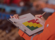 Assessor completing a fire risk assessment risk rating matrix on a clipboard